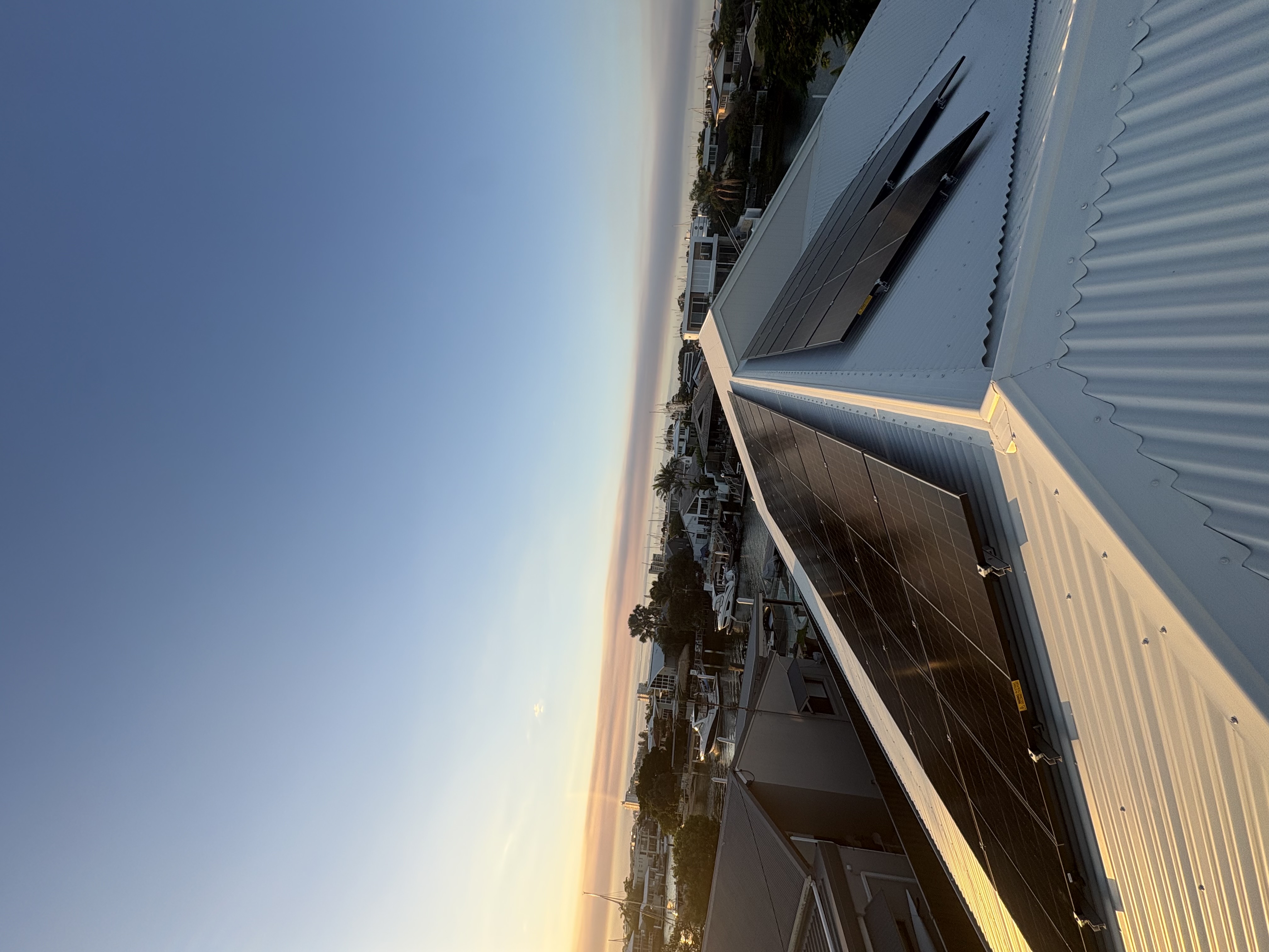 Sunshine Coast home with rooftop solar at sunset